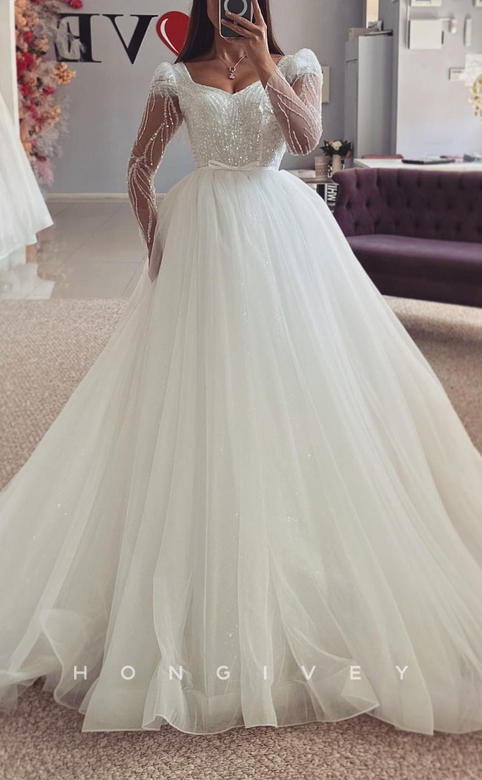 Bateau Long Sleeve Sequined Appliques Empire Tulle Wedding Gown