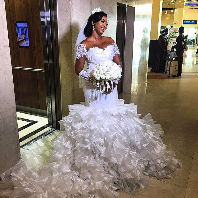 Short Sleeves Off-Shoulder White Mermaid Wedding Dress with Ruffles